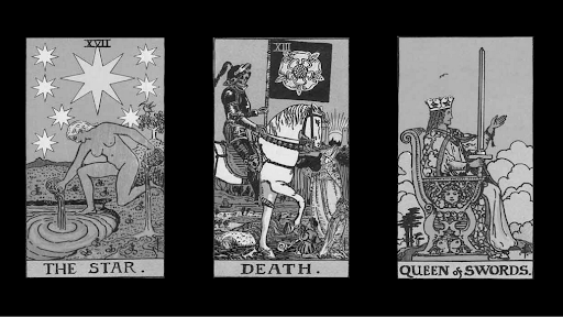 Three cards on top of a black background. The first is The Star, the second Death, and the third is Queen of Swords.